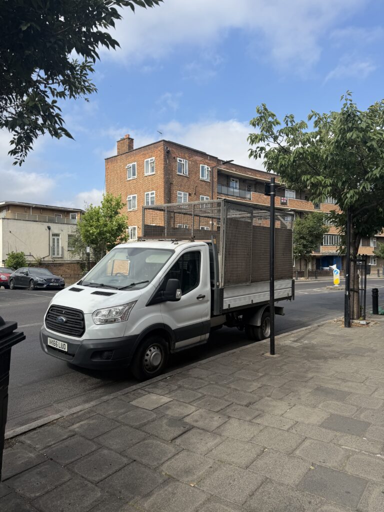 Mullaekey's Clearances rubbish clearance van working in Stoke Newington, North London